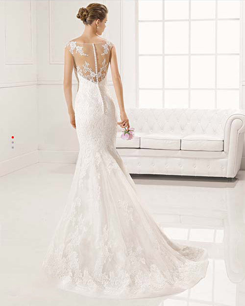 Mermaid bridal gown with lace accents from Rosa Clara