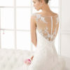 Mermaid bridal gown with lace accents from Rosa Clara