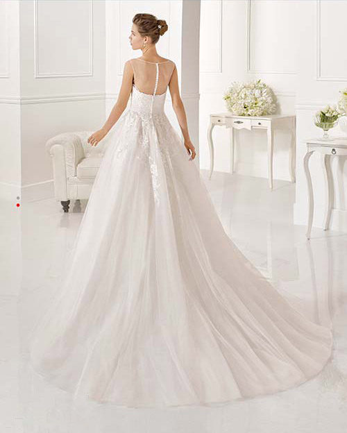 From Barcelona, Spain fashion and luxury get together to create a collection for the most demanding brides. The Adriana Alier wedding gowns from Rosa Clara have a style to satisfy all body types. Elegant bridal gowns that flatter and fit.