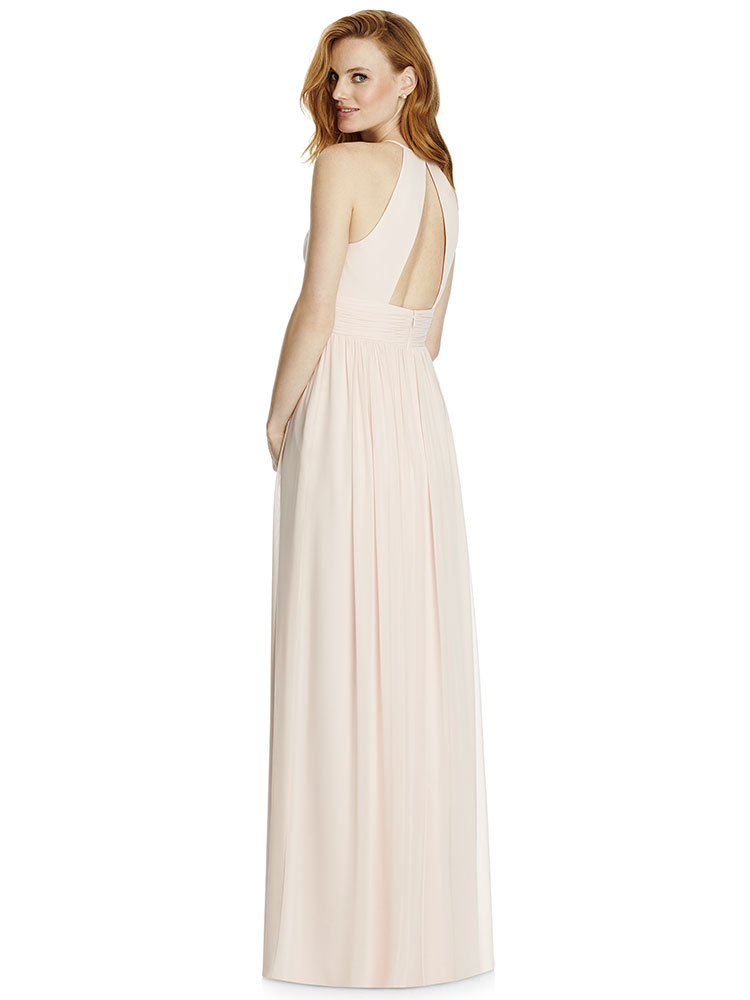Full length lux chiffon dress w/ gathered halter neckline and triangle cut out detail at back. Shirred inset midriff at natural waist. Shirred skirt