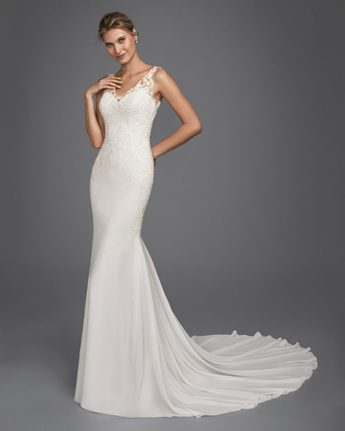 Mermaid-style beaded lace and chiffon wedding dress with tattoo-effect back.