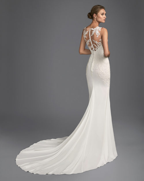 Mermaid-style beaded lace and chiffon wedding dress with tattoo-effect back.