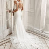 Mermaid-style crepe Georgette and lace wedding dress with deep-plunge neckline and low back.