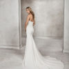 Mermaid-style beaded lace and crepe strapless wedding dress.