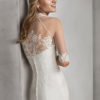 Mermaid-style beaded lace and crepe strapless wedding dress.