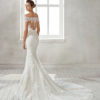 Mermaid-style lace wedding dress with off-the-shoulder neckline and lace appliqués, in nude and natural