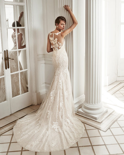 Mermaid-style beaded lace wedding dress with sweetheart neckline and tattoo-effect back, in nude and natural.