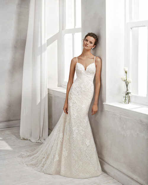 Mermaid-style beaded lace wedding dress with sweetheart neckline and tattoo-effect back, in nude and natural.