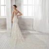 Mermaid-style beaded lace wedding dress with V-neckline, in nude and natural.