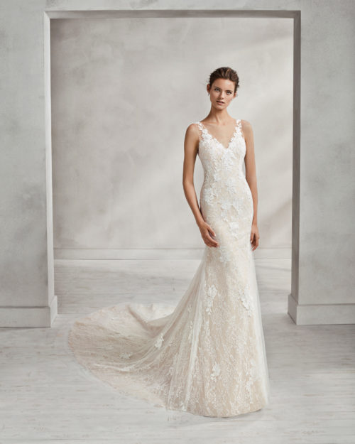 Mermaid-style beaded lace wedding dress with V-neckline, in nude and natural.