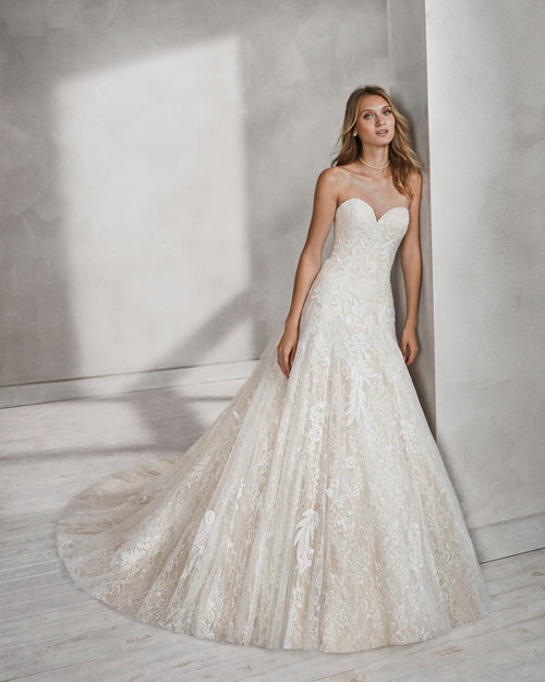 A-line beaded lace wedding dress with sweetheart neckline, in nude and natural.