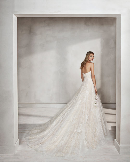 A-line beaded lace wedding dress with sweetheart neckline, in nude and natural.