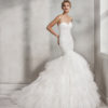 Mermaid-style beaded lace wedding dress with V-neckline and low back.