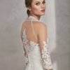 Mermaid-style beaded lace wedding dress with V-neckline and low back.