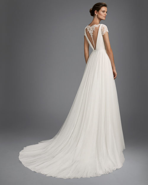 Beaded lace and tulle sheath wedding dress with short sleeves, V-neckline and low back.