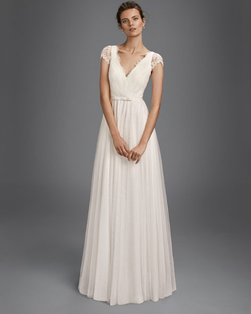 Beaded lace and tulle sheath wedding dress with short sleeves, V-neckline and low back.