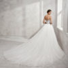 Princess-style lace wedding dress with sweetheart neckline and full tulle skirt, in natural/silver and natural.