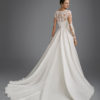 Princess style beaded lace and organza wedding dress with long sleeves and illusion neckline.