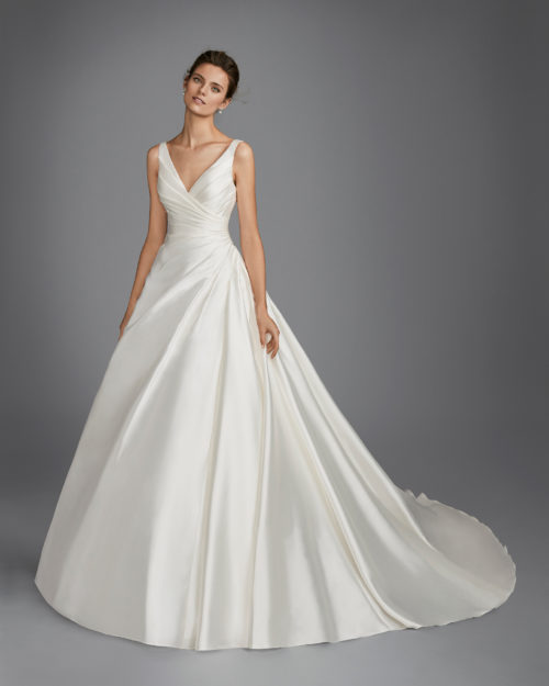 Classic-style mikado wedding dress with V-neckline and gathered side.