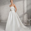 Classic-style mikado strapless wedding dress with beaded belt.