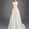 Classic-style piqu_ wedding dress with bateau neckline, V-back and bow at waist.