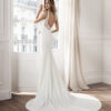 Classic lines with a low-cut back. Wedding gown for the bride who loves tradition.