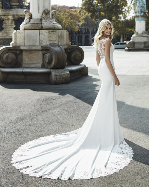 Wedding Gown - Sleevless, deep cut lace back with clasic lines.