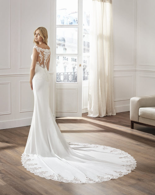 Wedding Gown - Sleevless, deep cut lace back with clasic lines.