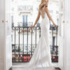 Bridal Dress - Sleeveless gown with low-cut back covered with lace and covered buttons