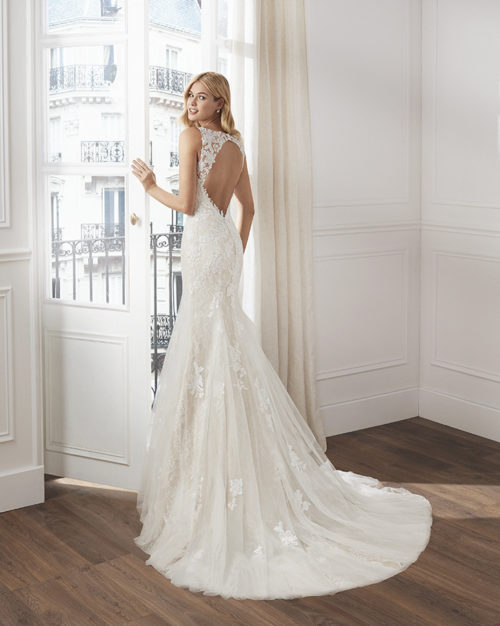 Bridal Gown - Sleeveless mermaid style with exquisite lace detail and low back.