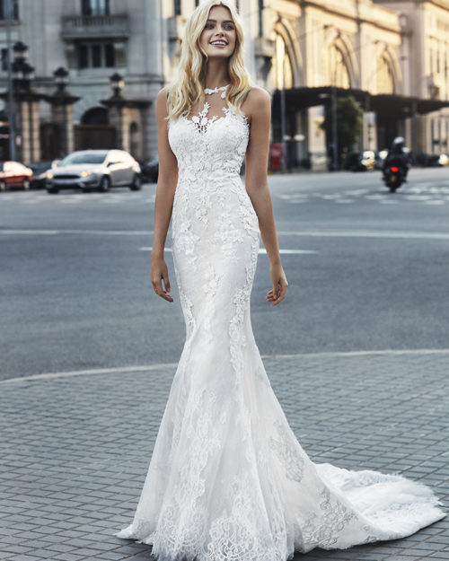 Bridal Gown - Sleeveless mermaid style with exquisite lace detail and low back.