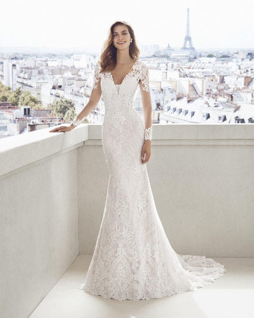 Bridal Gown - Lace and more lase! Delacate frames the neclane with subtle sleeves. Mermaid style