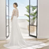 Sheath-style wedding dress in lace and crepe Georgette with beaded neckline. V-neckline and back.