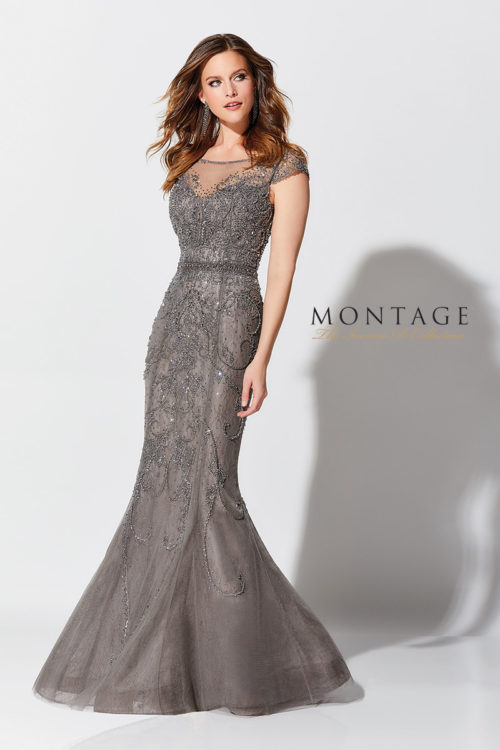 Hand-beaded tulle mermaid gown with illusion cap sleeve and bateau neckline, sweetheart bodice with beaded natural waist, illusion back, horsehair hemline. COLORS:  Dark Gray, Apricot, Navy Blue, Charcoal Nude SIZES:  4 - 26W