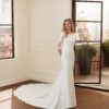 LARINE Mermaid-style wedding dress in stretch crepe with body-shaping lining, three-quarter sleeves, beading and lace back.