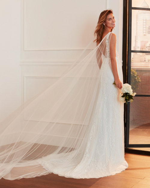 LAYLA Mermaid-style lace and tulle wedding dress with beading, draped tulle and low V-back.