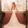 LENOX Mermaid-style wedding dress in lace and dot tulle with beading, sweetheart neckline and back with round opening.