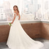 LIANI Princess-style lace and dot tulle wedding dress with sweetheart neckline, V-back with beaded strap and full skirt.