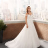 LIANI Princess-style lace and dot tulle wedding dress with sweetheart neckline, V-back with beaded strap and full skirt.