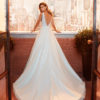 LUCER Classic beaded lace wedding dress with deep-plunge neckline and low V-back.